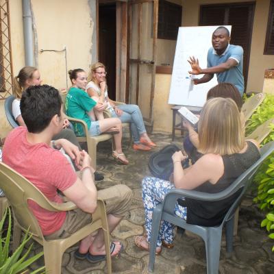 Volunteers receive a language lesson as an add on to their project